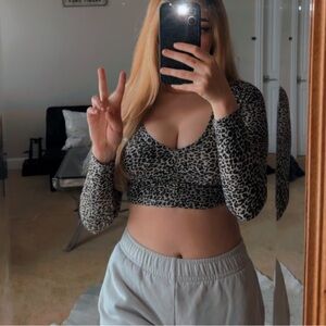 Leopard print cropped longsleeve cinched style front, v neck, size S